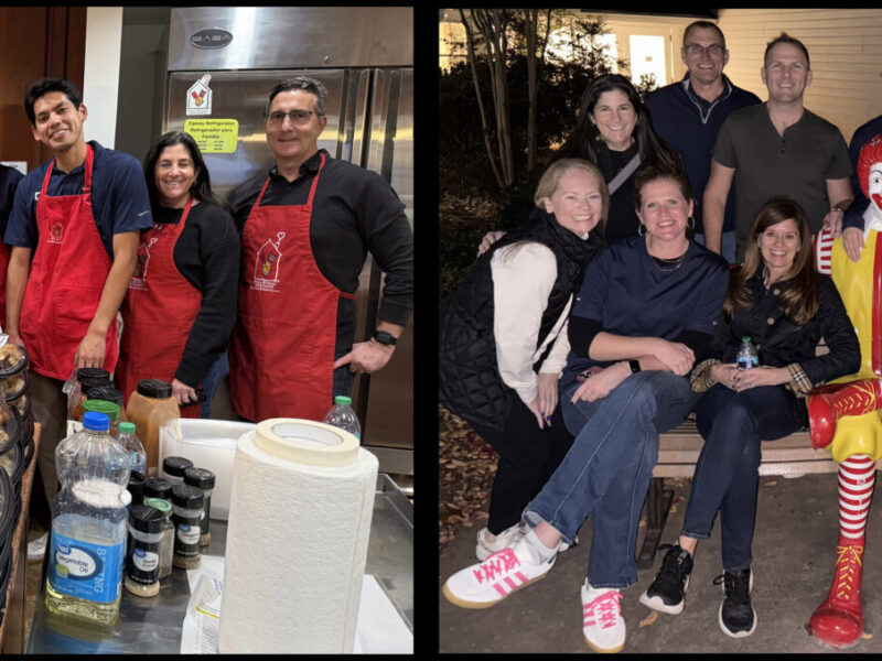 Volunteers from a corporate group gather at Ronald McDonald House in Northern Virginia after preparing a home-cooked meal for families. The first photo shows smiling volunteers in red aprons standing behind trays of freshly prepared food; the second shows the same group outside the House, sitting with the Ronald McDonald bench statue, sharing smiles after serving families in need.